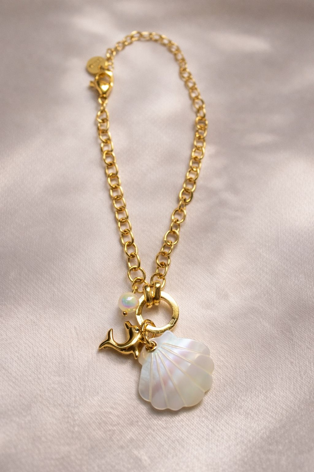 Gold Mother of Pearl Seashell & Dolphin Charm Necklace – Elegant Ocean-Themed Coastal Jewelry