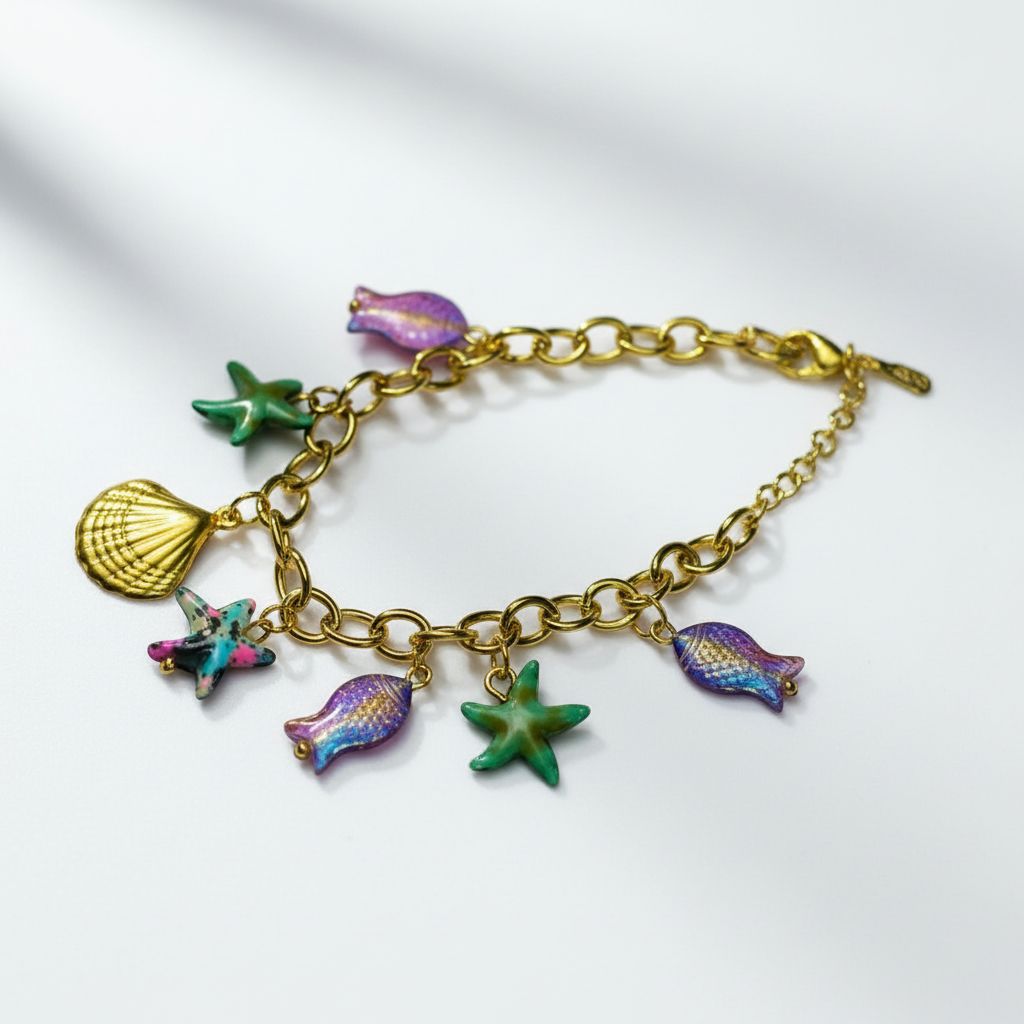 Gold Nautical Ocean Charm Bracelet – Whimsical Sea Life Jewelry with Starfish, Shell, and Fish Charms