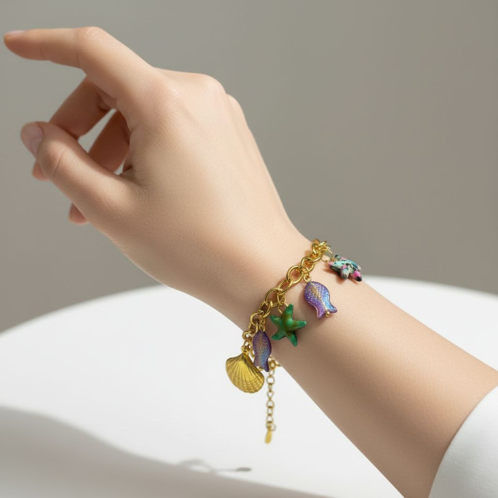 Gold Nautical Ocean Charm Bracelet – Whimsical Sea Life Jewelry with Starfish, Shell, and Fish Charms - Image 2