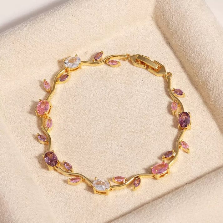 Elegant gold-toned bracelet with pink and crystal stones—perfect for everyday wear and special occasions. - Image 4